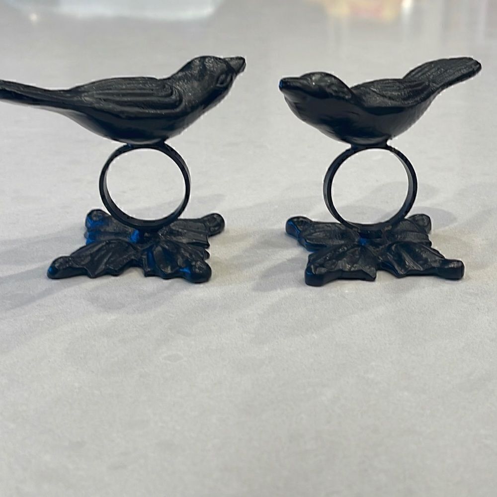 Cast iron black birds? Crows? napkin rings excellent shape.  2 in lot.